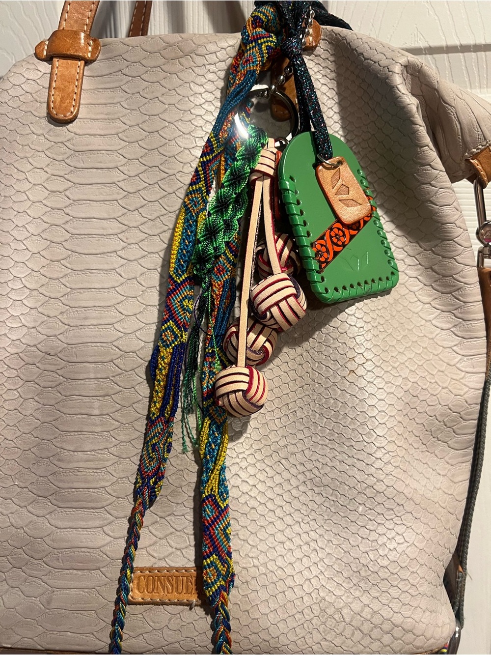 Consuela Cream Textured Tote with Green Leather Charm and Multicolor Tassels